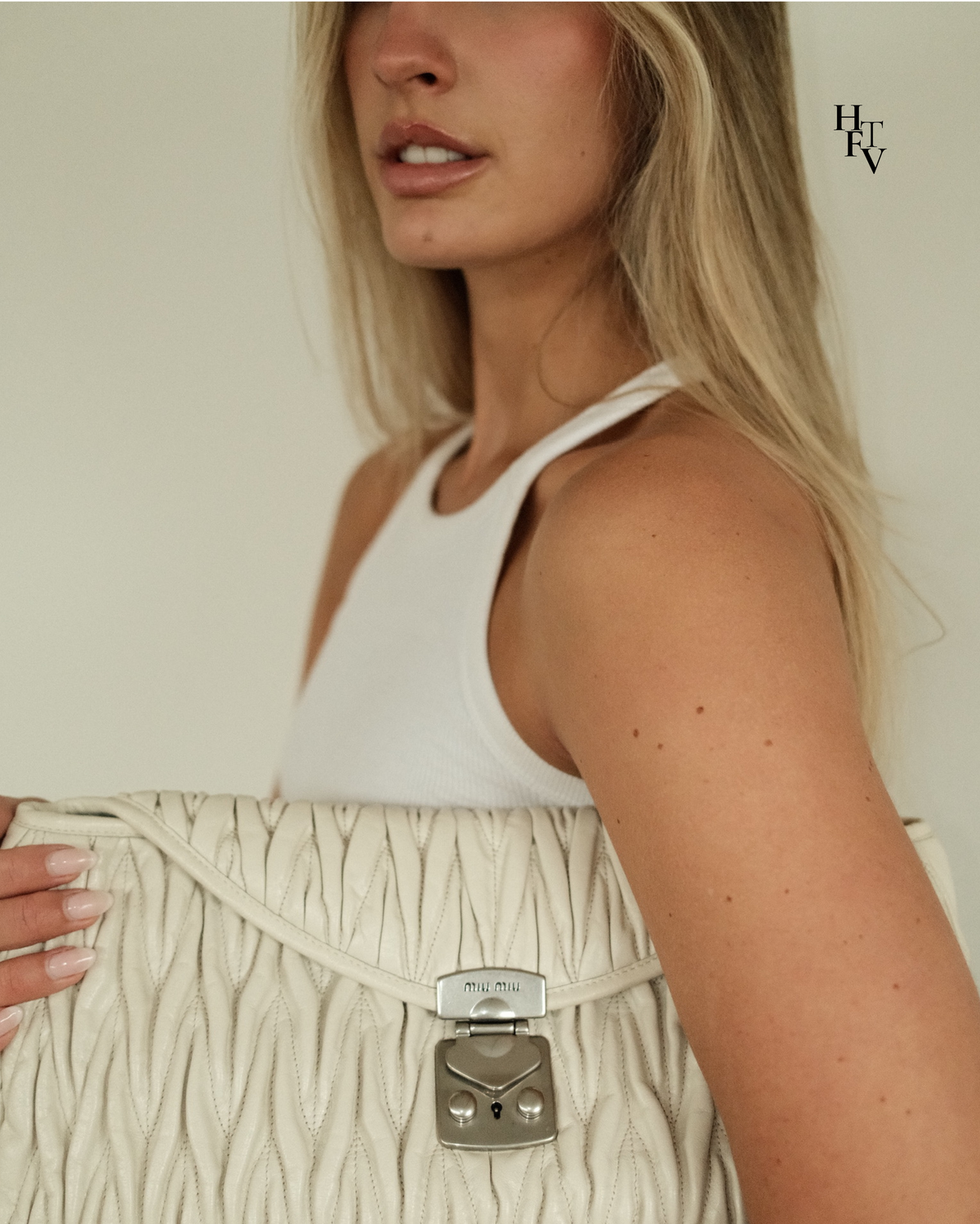 Miu Miu Super Oversize Clutch in Off White