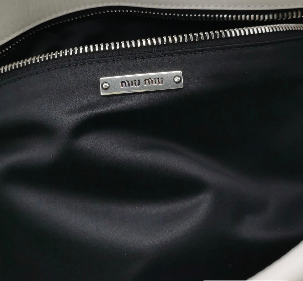 Miu Miu Super Oversize Clutch in Off White
