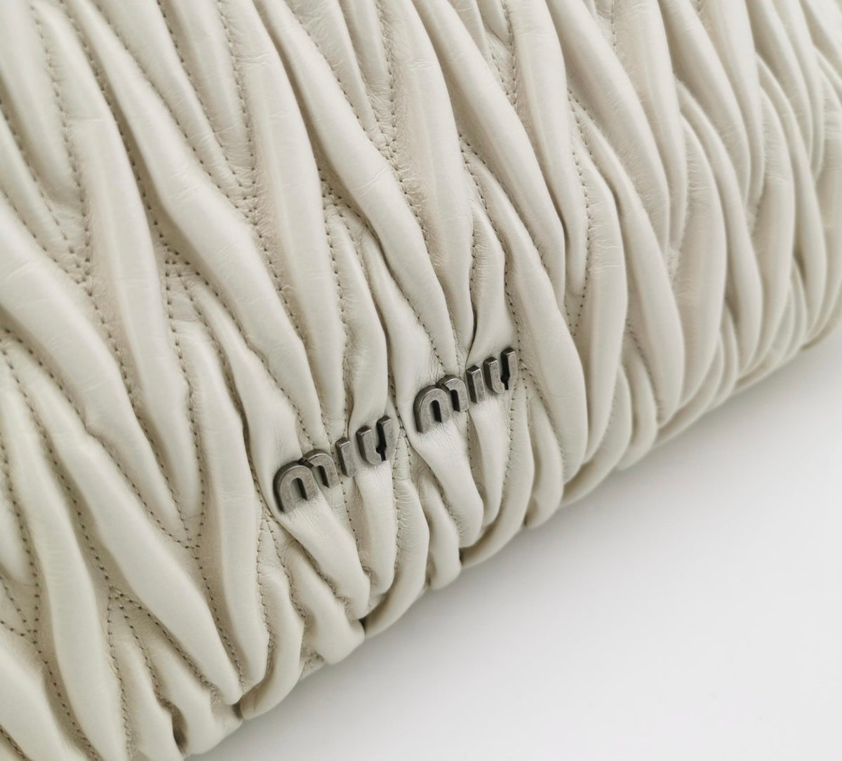 Miu Miu Super Oversize Clutch in Off White