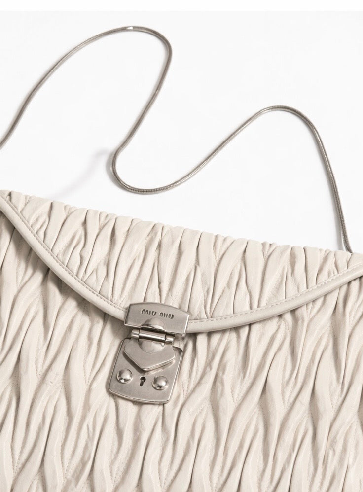 Miu Miu Super Oversize Clutch in Off White