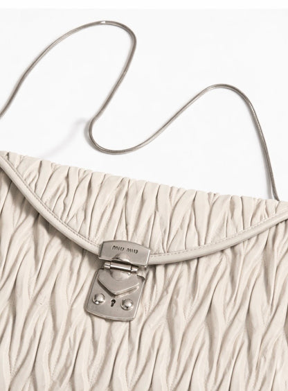 Miu Miu Super Oversize Clutch in Off White